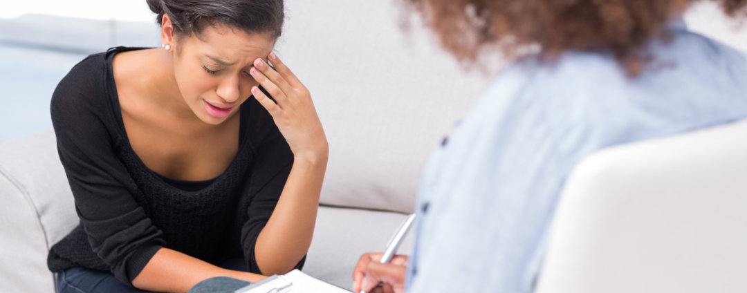 woman crying in front of the therapist